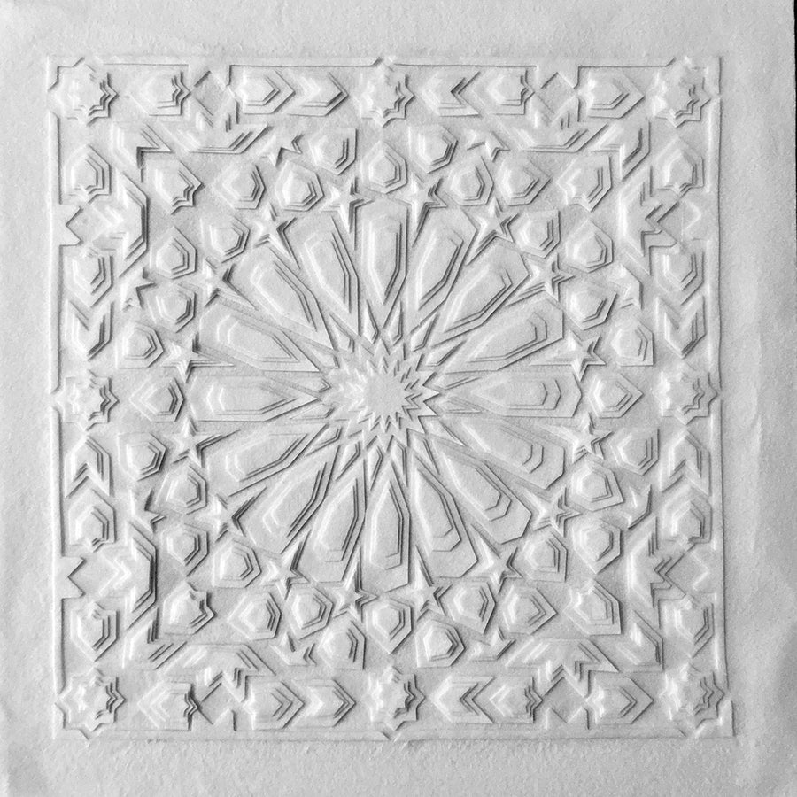 Artwork by British-Bengali Textile Fine Artist, Jennifa Chowdhury. Intricate white Laser Cut Textile pieces layered to create a geometric design inspired by traditional Islamic Art.