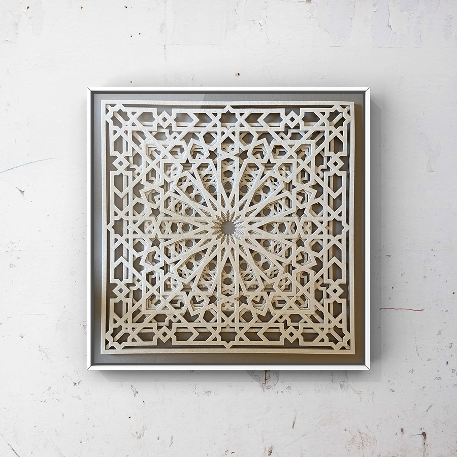 Framed Artwork by British-Bengali Textile Fine Artist, Jennifa Chowdhury. Intricate white Laser Cut Textile Design, inspired by the geometric patterns used in traditional Islamic Art.