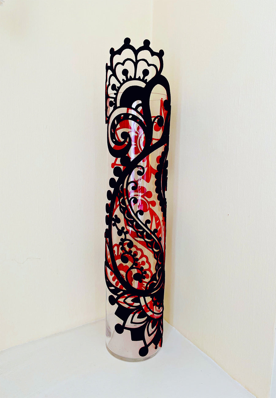 Red and Navy Textile and Glass Vase by Jennifa Chowdhury, featuring a paisley pattern design inspired by the traditional female ‘Vrata’ rituals of Bengal.